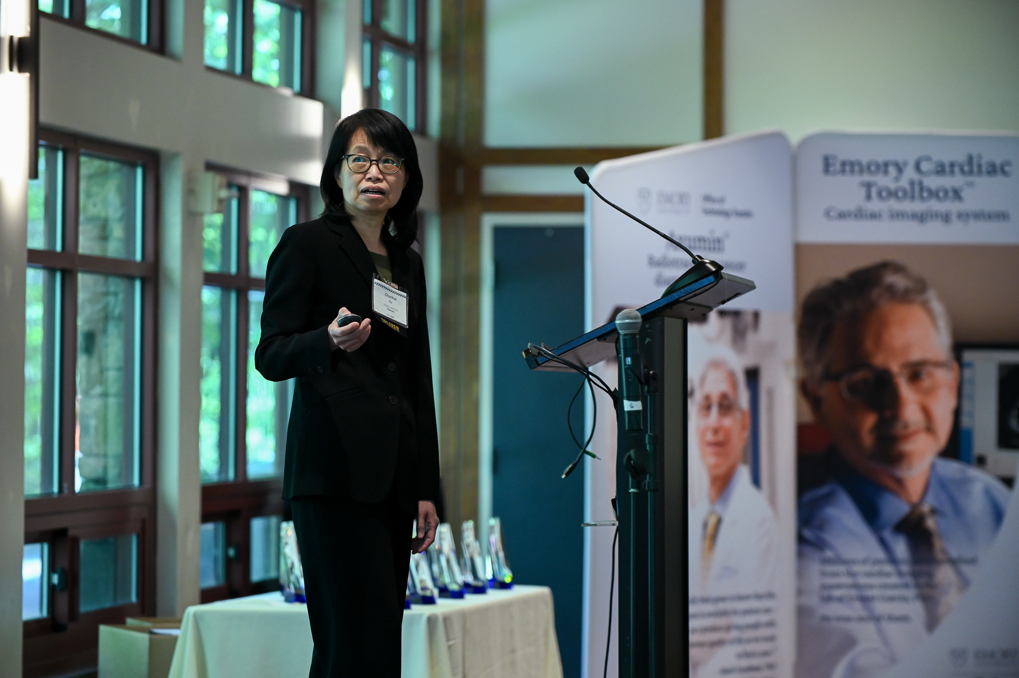 Woman presenting at podium